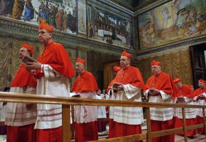 Cardinals enter the Sistine Chapel at th